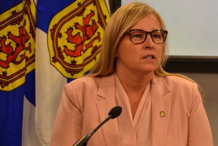 Karla MacFarlane, community services minister and minister responsible for the Office of L'nu Affairs, answers questions after a Progressive Conservative government cabinet meeting in downtown Halifax on Thursday. SALTWIRE NETWORK