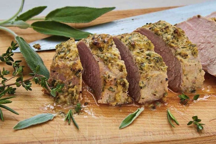 Oven-baked pork tenderloin from Culinary Herbs: Grow. Preserve. Cook! by Ontario herb specialist Yvonne Tremblay.