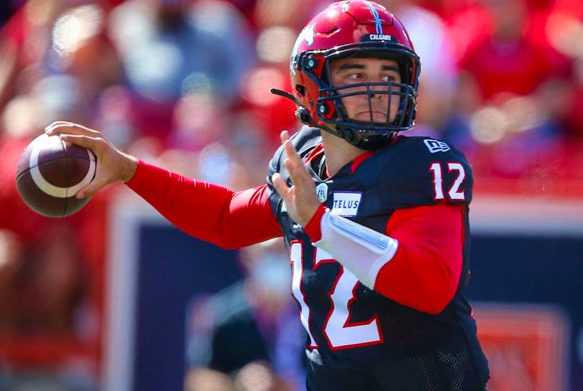 Calgary Stampeders quarterback Jake Maier looks for an open receiver against the Edmonton Elks at McMahon Stadium in Calgary on Monday, Sept. 6, 2021. 