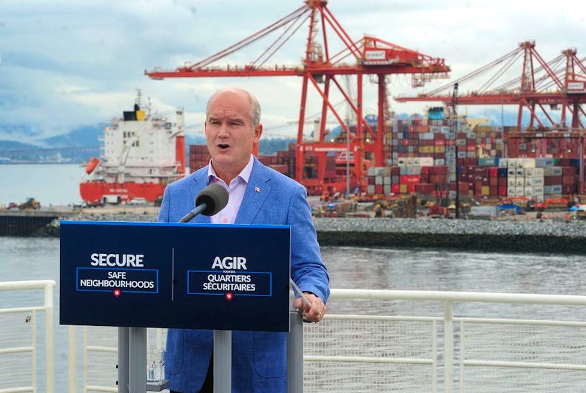 Conservative party leader Erin O'Toole campaigning in Vancouver, with the container port as a backdrop, at Canada Place on Sunday. The Tories hope to make further inroads in B.C. from the 2019 vote, when they captured 17 seats in the province.