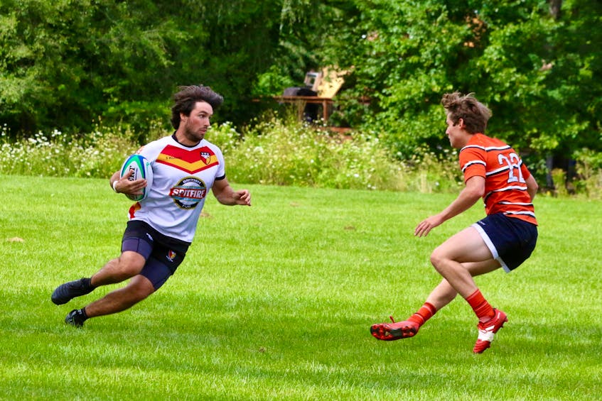 Luke MacPherson helps advance the ball for the Valley Rugby Union. - Carole Morris-Underhill