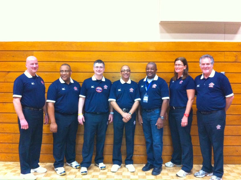 Brad Barton, centre, was the supervising official at the 2013 Atlantic Collegiate Athletic Association Volleyball Championships at Université Sainte Anne. From left are: Neil Deveau, David Fairfax, Paul Worden,   Barton, Anthony Pleasant, Susanne Dittmer  and Bob Moore. - Contribited