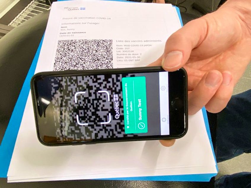 According to the Quebec government, when the QR code on a fully vaccinated person's phone is scanned, an 