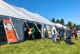 People mingle around one of the tents used for orientation on Tuesday at Cape Breton University. Students' union reps said more students have been participating in orientation events than before the pandemic. NICOLE SULLIVAN/CAPE BRETON POST 