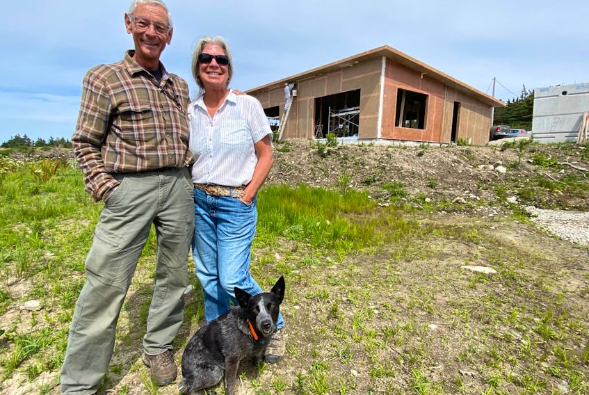 Ray Ligenza and his partner Wendy St. Jean, at the front of their composite home in Sandford, Yarmouth County. The house is being constructed with recycled PET (polyethylene terephthalate) plastic bottles. 
CARLA ALLEN • TRI-COUNTY VANGUARD