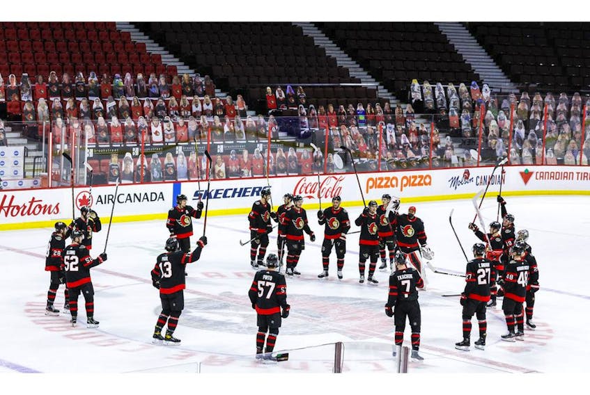 -OTTAWA- May 12,2021. The Ottawa Senators acknowledge the fans at the empty Canadian Tire Centre following their last game of the season where they defeated the Toronto Maple Leafs in overtime. ERROL MCGIHON/Postmedia