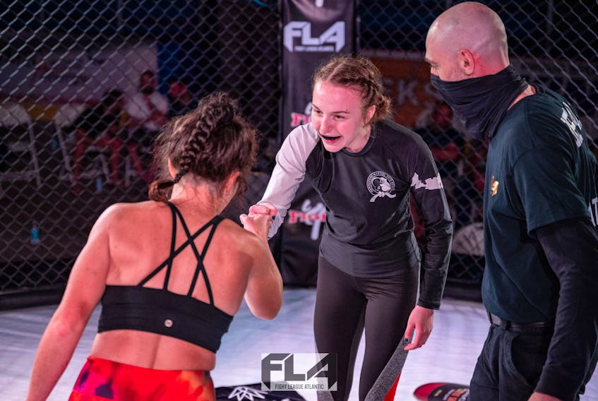 Sarah Wilson and Abbie Wainwright at a Fight League Atlantic event. Photo by Top Rope Photo.