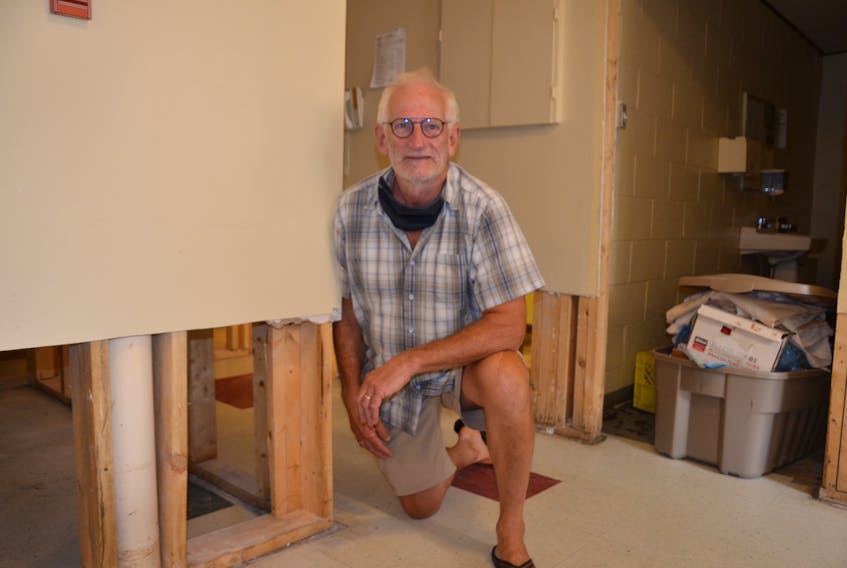 Open Arms core volunteer Bruce Caldwell surveys the damages to Father Jack’s Place in the basement of St. Joseph’s Catholic Church in Kentville. A recent sewage flood has forced the temporary relocation of the Inn From The Cold shelter, which operates there. KIRK STARRATT