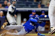 Blue Jays baserunner Lourdes Gurriel Jr. scores on a wild pitch by Yankees pitcher Lucas Luetge during the fourth inning at Yankee Stadium in New York City, Wednesday, Sept. 8, 2021.