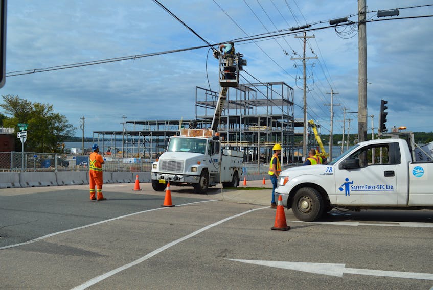 It has been a busy summer in and around Sydney with new construction, paving and installations of new wiring. With the construction of the new Nova Scotia Community College in the background, these workers were installing new lines this morning on Charlotte Street. CAPE BRETON POST