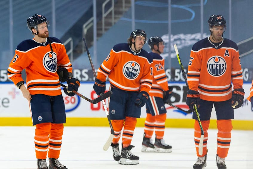 Edmonton Oilers players exit the ice after losing 6-1 to the Toronto Maple Leafs at Rogers Place in Edmonton on Wednesday, March 3, 2021.