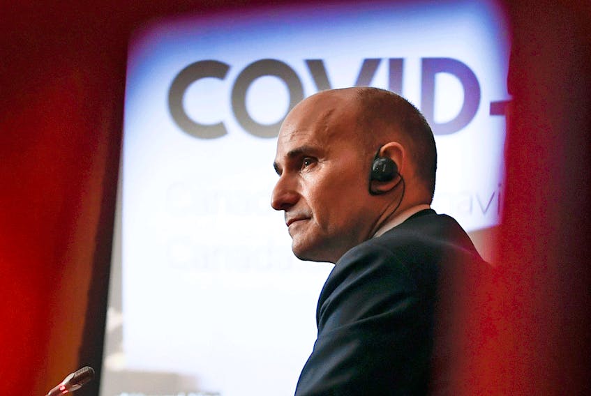  Health Minister Jean-Yves Duclos participates in a news conference on the COVID-19 pandemic and the omicron variant, in Ottawa, on Friday, Dec. 17, 2021.