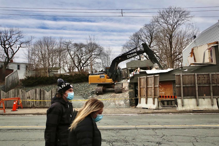The Portland Street building that was once the denturist office the infamous Portapique killer, is razed by an excavator in Dartmouth Monday Jan. 10, 2022. The site is being prepared for future development.
TIM KROCHAK