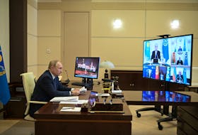 Russian President Vladimir Putin attends an extraordinary meeting of the Council of the Collective Security Treaty Organization (CSTO) on the situation in Kazakhstan after violent protests, via a video link at the Novo-Ogaryovo state residence outside Moscow, Russia, on Jan. 10, 2022. Sputnik/Aleksey Nikolskyi/Kremlin via REUTERS