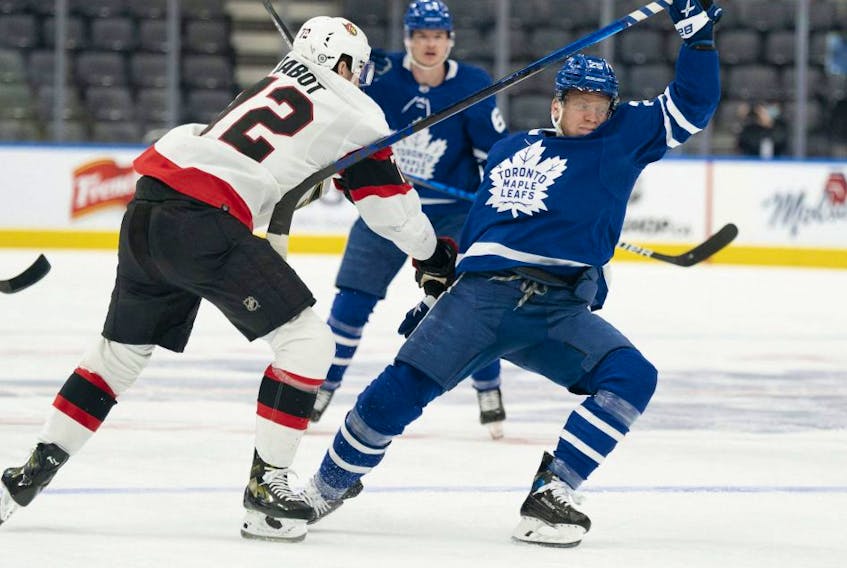  Senators defenceman Thomas Chabot (72) battles with Maple Leafs right wing Ondrej Kase. Kase could be back in the lineup tonight against Vegas.
