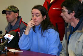 Penny Boudreau makes a plea at a news conference Jan. 29, 2008 for the safe return of her daughter, Karissa. She reported her 12-year-old girl missing two days earlier. Karissa's father, Paul Boudreau, is on the left and to the right is her boyfriend, Vernon Macumber. - Bev Ware / File