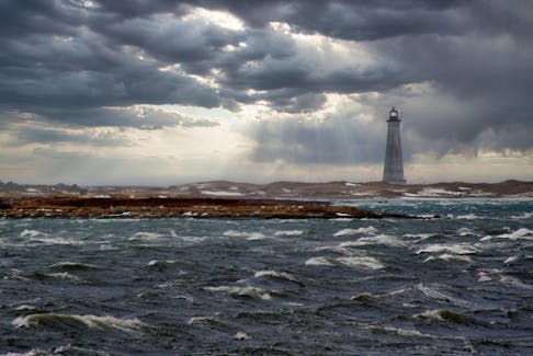 Clark Swimm photographed this ominous view of the Cape Sable Lighthouse from The Hawk, N.S. It is the most southerly point in Nova Scotia on Cape Sable Island. Clark noted the day was blustery with strong northwest winds, which is certainly evident in the photograph. The Cape Sable Lighthouse is the tallest in the province, standing at 101 feet tall. Thanks for sharing, Clark.