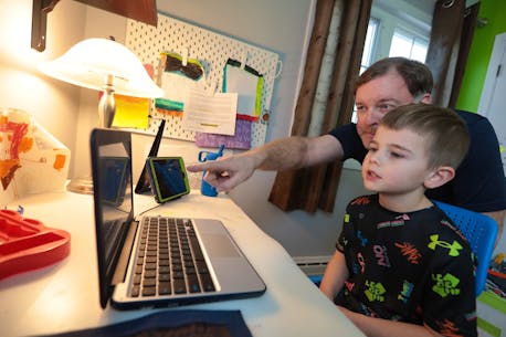 Dartmouth family with three elementary kids makes week of online learning work