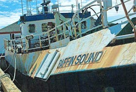 The fishing board Baffin Sound sat abandoned at a wharf in St. Anthony, N.L., for about a dozen years until the Canadian government spent $100,000 to have it removed. FILE PHOTO