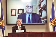 Nova Scotia Premier Tim Houston is joined through teleconference by Dr. Robert Strang, chief medical officer of health, at a COVID-19 briefing on Wednesday, Jan. 12, 2022.
