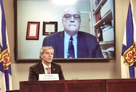 Nova Scotia Premier Tim Houston is joined through teleconference by Dr. Robert Strang, chief medical officer of health, at a COVID-19 briefing on Wednesday, Jan. 12, 2022.