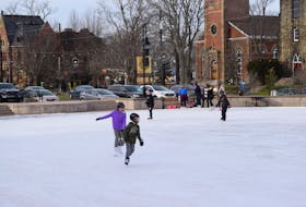 Skaters enjoying the downtown ice at Civic Square in Truro.