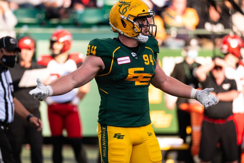 Edmonton Elks defensive tackle Jake Ceresna (94) reacts to a referee’s call as he plays the Calgary Stampeders at Commonwealth Stadium in Edmonton, on Sept. 11, 2021.