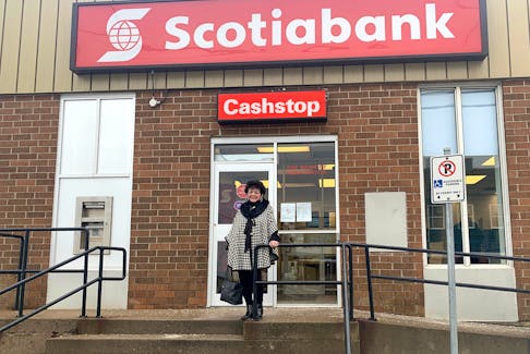 Mickey Bushnik, a Scotiabank client at the Sydney Mines branch for more than 50 years, is extremely upset the company has decided to merge it with the North Sydney location in June. “What are the people going to do?” she said. Chris Connors/Cape Breton Post