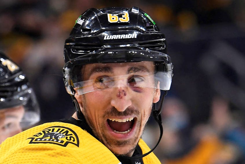 Boston Bruins left-winger Brad Marchand reacts after scoring his first goal during the first period against the Montreal Canadiens at TD Garden on Wednesday.