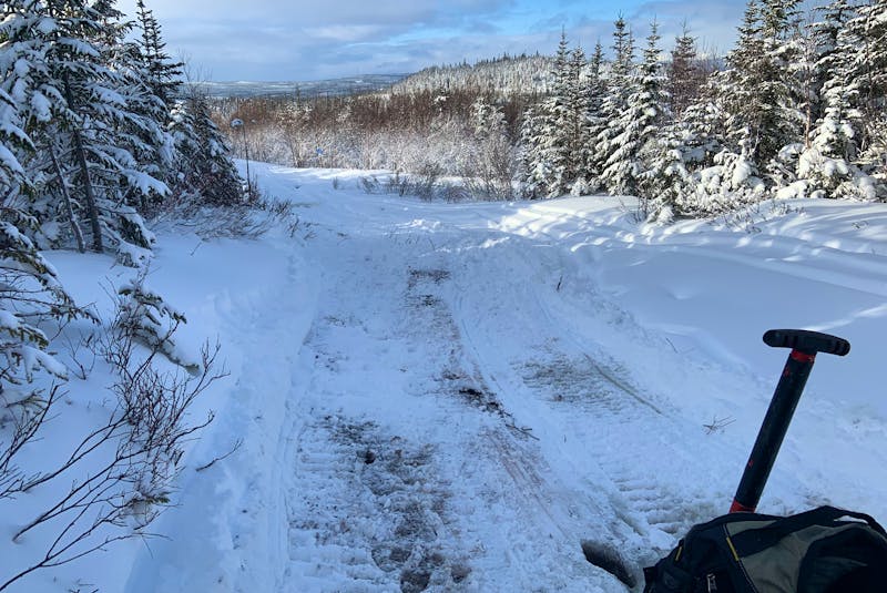 Snowmobile riders on the west coast are being advised to watch out for hazards on the trails as many still don’t have enough snow on them and have been impacted by recent rainfalls. This trail is part of the Western Sno-Riders network between Massey Drive and Marble Mountain.
