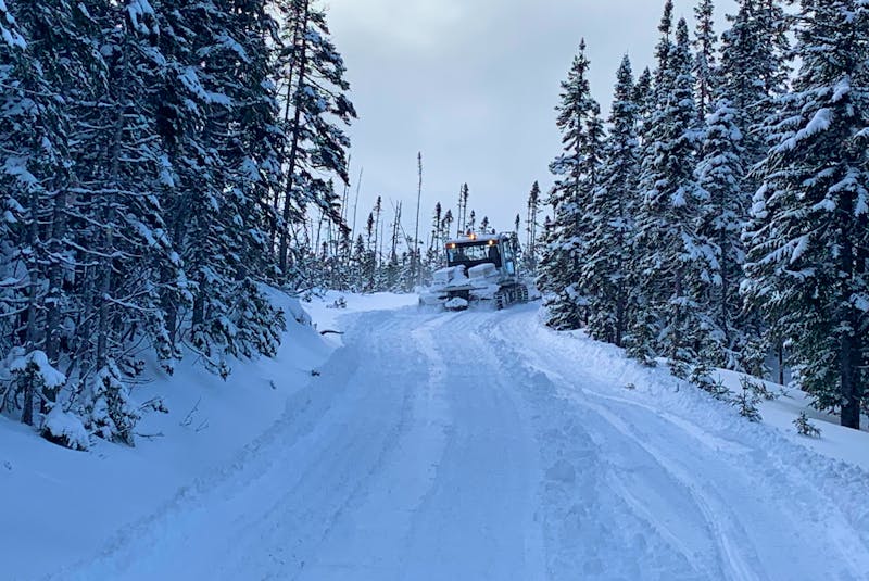 A Western Sno-Riders groomer spent part of Wednesday, Jan. 12, making repairs to the snowmobile trail from Massey Drive to Marble Mountain where a lack of snow has exposed hazards.