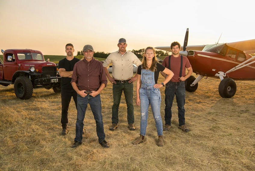 The crew of History channel's Lost Car Rescue television program, from left, Lee Brandt, Dave Mischuk, Matt Sager, Jessica James and Steve Sager. Photo courtesy of Proper Television for Corus Entertainment