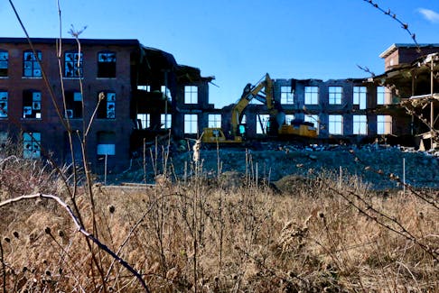 With most of the windows already smashed out, and a roof that had collapsed in February 2021, the building that housed the once bustling Nova Scotia Textiles plant was already in rough shape when construction crews began dismantling it Dec. 15.