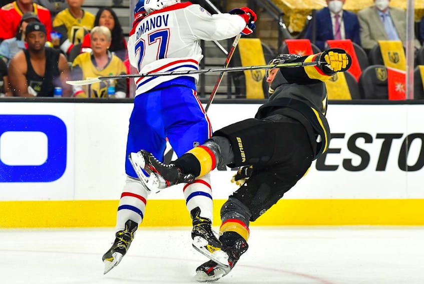  Canadiens’ Alexander Romanov checks Vegas Golden Knights defenceman Alex Pietrangelo during 2021 Stanley Cup semifinals at T-Mobile Arena in Las Vegas on June 14, 2021.