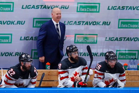 Olympics-Julien steps in to lead Canada men's ice hockey team in Beijing