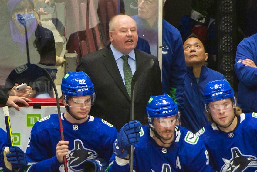Canucks head coach Bruce Boudreau, making his point from behind the Canucks bench during a Rogers Arena game last month, says he likes the scoring chances his club is getting. ‘We’d like to funnel more pucks to the net. We’d like to have more traffic in front of the net,’ he says.