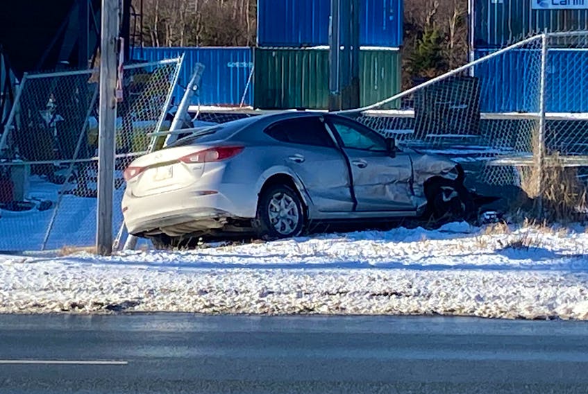 This car left Torbay Road and crashed into a fence following a two-car collision Monday, Jan. 17, 2022 just inside the town's boundary.