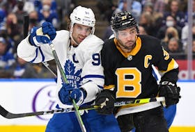 Maple Leafs captain John Tavares (left) battles for position with Boston Bruins counterpart Patrice Bergeron earlier this season. The Bruins are on a five-game winning streak and closing fast on the third-place Toronto in the Atlantic Division. 