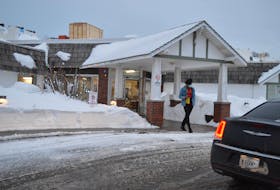 A person walks out of the Garden Home in Charlottetown on Jan. 17.