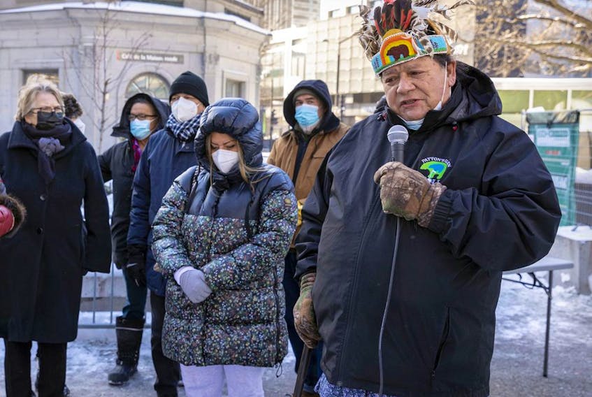 Charlie Patton, an elder from Kahnawake, speaks at a memorial in Cabot Square on Tuesday to mark the one-year anniversary of the death of Raphaël "Napa" André.