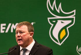 Chris Jones speaks to the media as he is introduced as the new Edmonton Elks general manager and head coach in Edmonton, on Tuesday, Dec. 21, 2021.