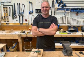 Rob Calabrese is seen at the Nova Scotia Power Makerspace in Sydney. He used tools and equipment at the Makerspace to start his business Norté Design, which makes wooden holders for high-tech gadgets like smartphones and tablets. CONTRIBUTED/ NORTÉ DESIGN