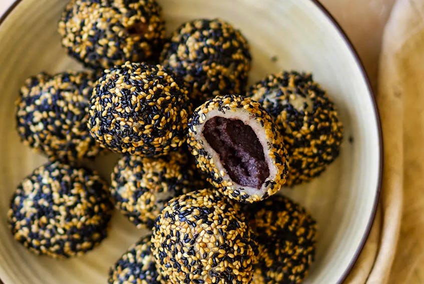 Fried sesame balls, a traditional Chinese New Year treat, from Mooncakes and Milk Bread. Kristina Cho photo