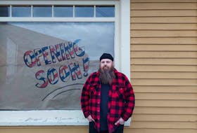 Matt Symonds, best known as Hef, poses for a photo in front of what will soon be Hef’s Barber Shop in Carbonear.