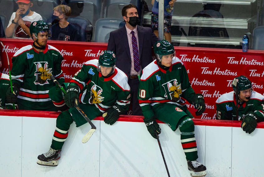 Halifax Mooseheads head coach Sylvain Favreau looks at a replay on the scoreboard during an exhibition game against the Cape Breton Eagles onSept. 11, 2021. - Ryan Taplin

