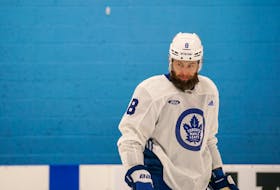 Veteran defenceman Jake Muzzin is out of the Maple Leafs' lineup with a concussion.