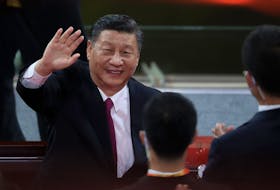 Chinese President Xi Jinping waves as he attends the art performance celebrating the 100th anniversary of the Founding of the Communist Party of China, in Beijing, June 28, 2021.