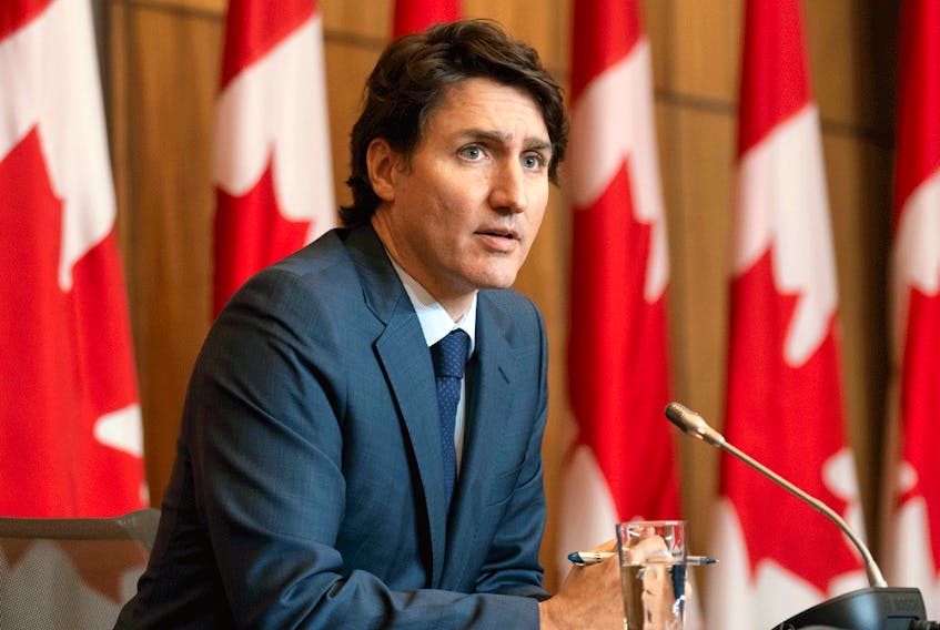 Prime Minister Justin Trudeau speaks during a news conference on January 19, 2022 in Ottawa.