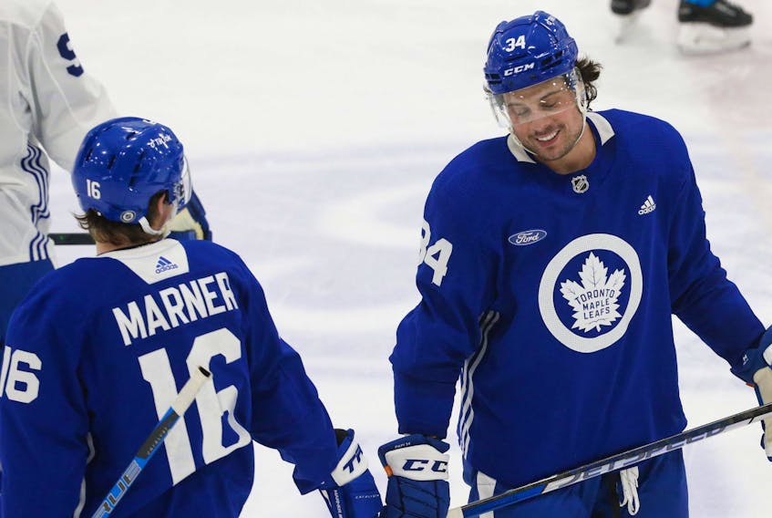 Toronto Maple Leafs Auston Matthews C was all smiles with teammate Mitch Marner RW during practice in Toronto on Sunday December 26, 2021. /