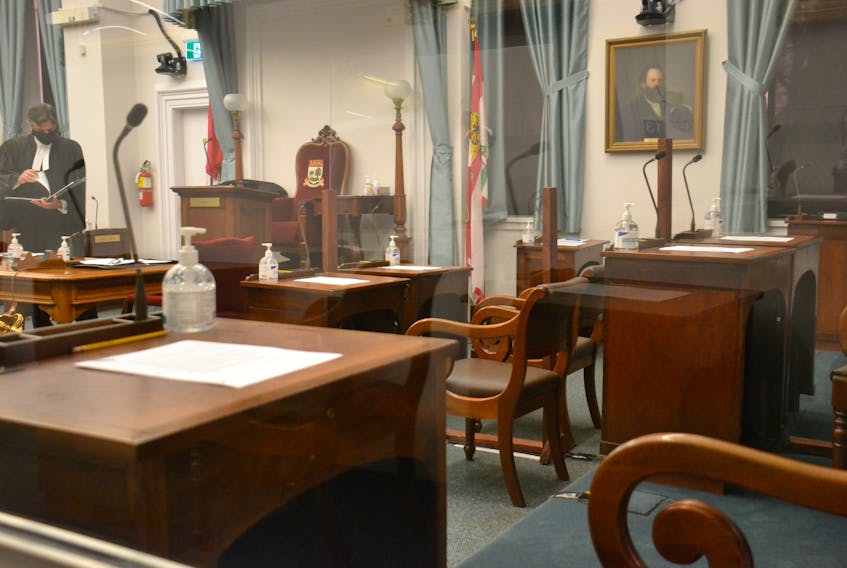 Empty desks within the legislative chamber of the Coles Building will stay that way until at least Jan. 21. The clerk of the P.E.I. legislative assembly has paused standing committee meetings until that date due to COVID-19 cases detected among staff. The legislature is currently operating under hybrid proceedings, meaning MLAs can attend in-person and virtually.